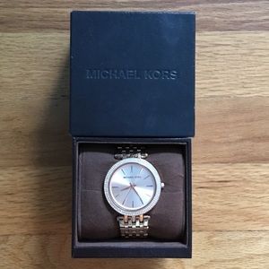 Rose gold watch with diamonds